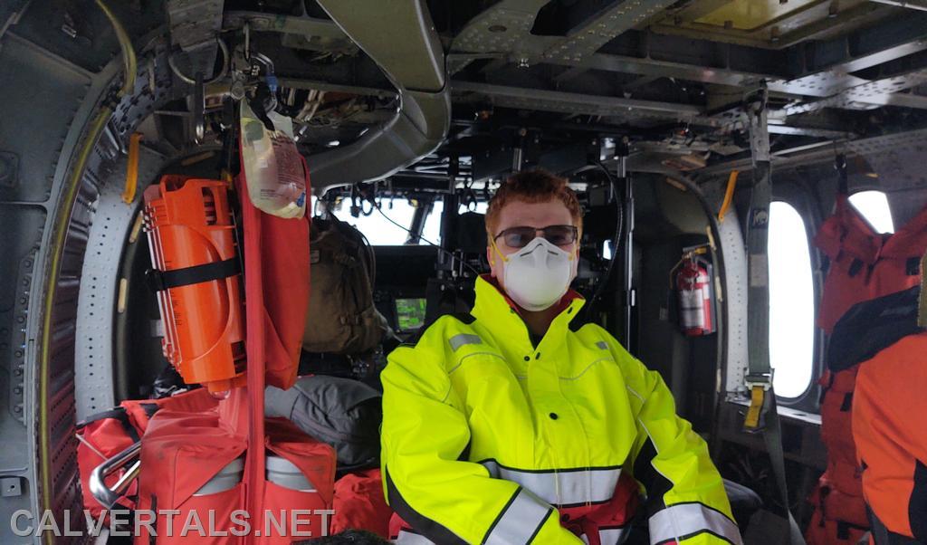 Paramedic Intern T. Doonan returning in the US Navy SAR helicopter after medevac mission.