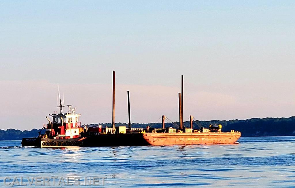 The North Beach fireworks barge being towed out into position in the Chesapeake Bay.