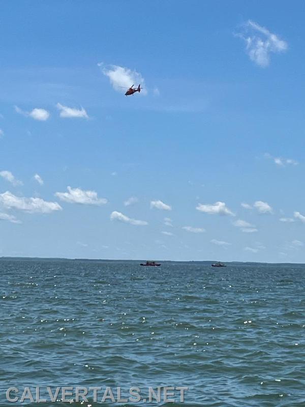 US Coast Guard Helicopter assisting in the search for a missing swimmer.