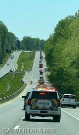 Many vehicles from across the region paid their respects in the procession.