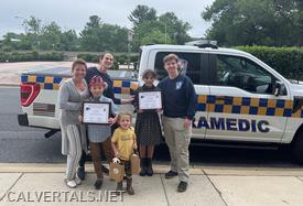 PMIC Kreider and Life Member Elliott at the Awards Ceremony in Montgomery County today with the award winners and their mother.