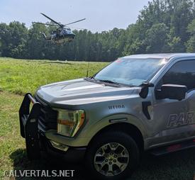 Due to the distance to the main road, the trooper was requested to land directly at the scene in the field.